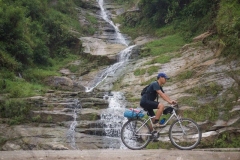 Biking Near Waterfall