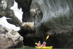 Couple Kayaking in Ha Long Bay, Vietnam