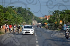 bicycling-down-road