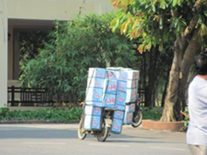 Cases of water on a motorbike in Vietnam