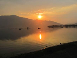 Sun setting on Vietnam fishing village