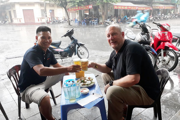 Drinking beer vy jorum with the locals in Hanoi